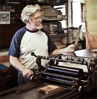 Alan Runfeldt, printer on the
                                Vandercook Proof Press