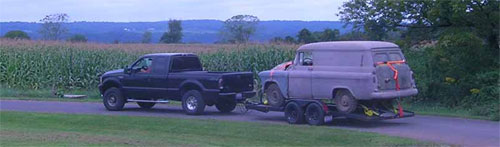 Neil Tows the 56 Chevy Panel truck back to Ohio
                    for restoration