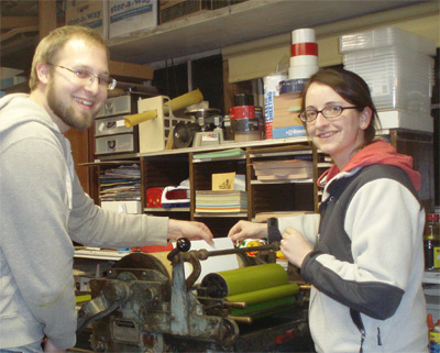 Chris &
                  Grae printing on the Vandercook