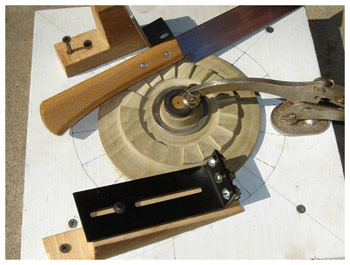 Jig used to cut teeth for ink disk