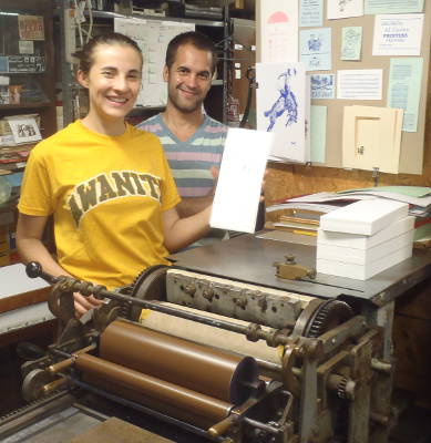 Antonia & Juan Printing on the
                    Vandercook