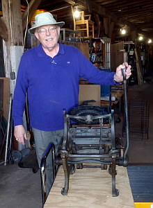 Bruce Olgilvey with his father's 6x9
                  Kelsey/Cook's Victor Printing Press