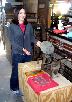 Rachael and her press during
                            restoration