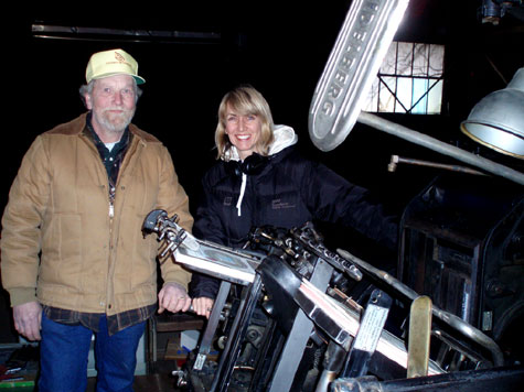 Bronwen Hughes with printer Alan Runfeldt and Heidelberg Windmill printing press on set of "White Collar"